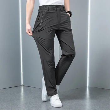 Мужские летние брюки большого размера из тонкого ледяного шелка, эластичные дышащие брюки с прямыми штанинами 8xl, быстросохнущий эластичный ремень, черные брюки 2023
